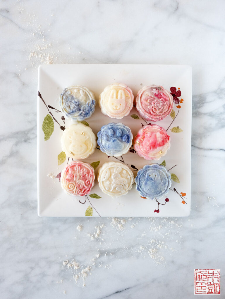 Premium Photo  Asian woman is making colorful snow skin moon cake